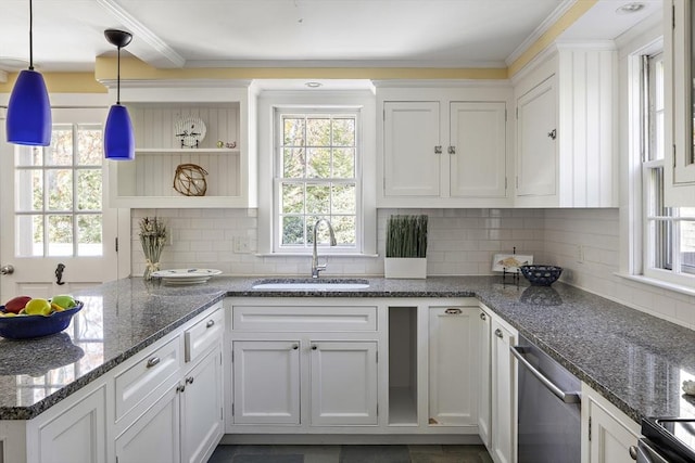 8 School House Vlg, Oak Bluffs, MA 02557 - kitchen with a sink, dishwasher, healthy amount of natural light, white cabinets, and ornamental molding