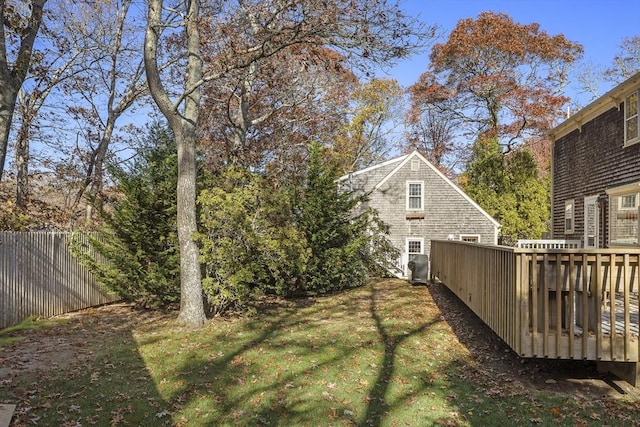 8 School House Vlg, Oak Bluffs, MA 02557 - view of yard featuring a deck