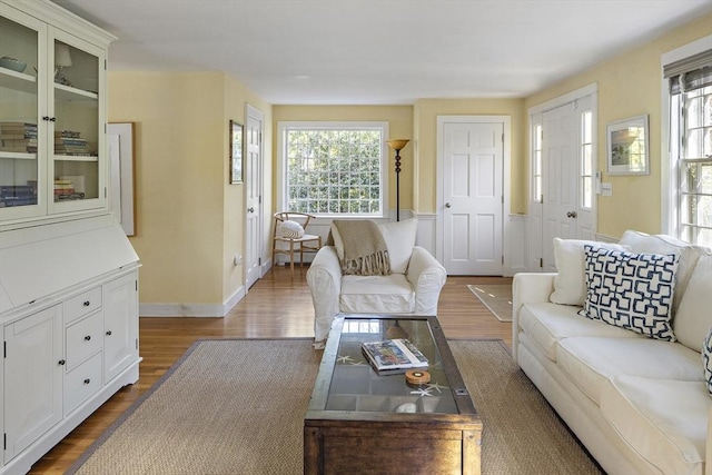 8 School House Vlg, Oak Bluffs, MA 02557 - living area featuring plenty of natural light and wood finished floors
