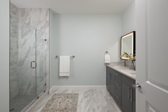 91 Miter Dr Unit 2-2, Plymouth, MA 02360 - full bathroom with marble finish floor, baseboards, a stall shower, and vanity