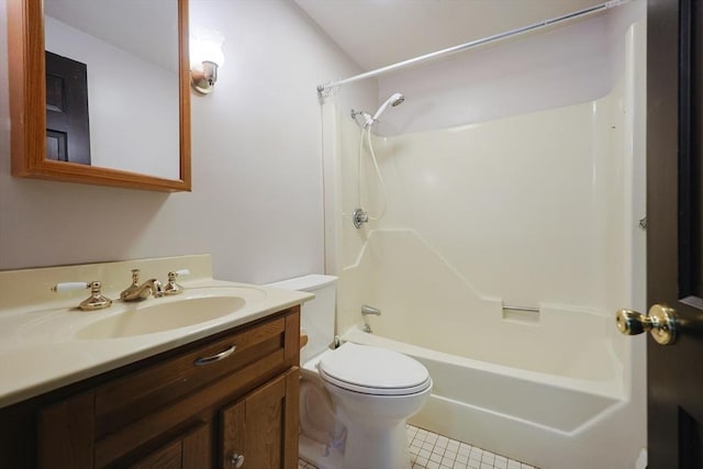 bathroom featuring vanity, tile patterned floors, toilet, and shower / tub combination