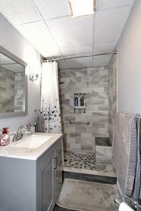 bathroom featuring vanity, a paneled ceiling, and curtained shower