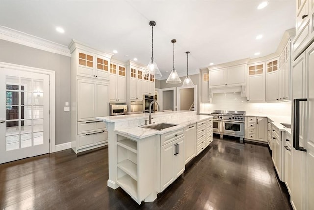 43 Bristol Rd, Wellesley, MA 02481 - kitchen with stainless steel appliances, open shelves, tasteful backsplash, a center island with sink, and dark wood-style floors