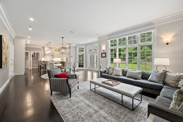 43 Bristol Rd, Wellesley, MA 02481 - living area with ornamental molding, recessed lighting, a chandelier, and dark wood-type flooring