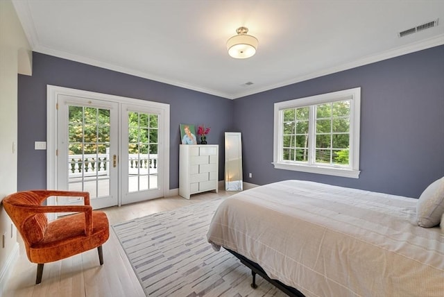 43 Bristol Rd, Wellesley, MA 02481 - bedroom with access to exterior, ornamental molding, and wood finished floors