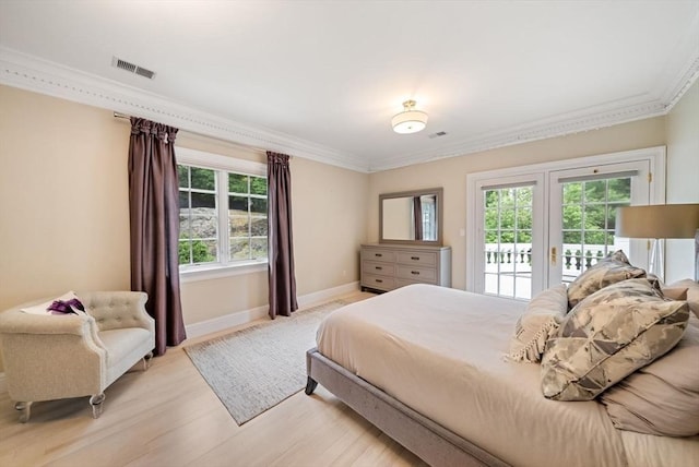 43 Bristol Rd, Wellesley, MA 02481 - bedroom with access to exterior, ornamental molding, light wood-style floors, and french doors