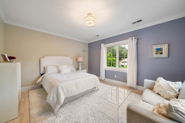 43 Bristol Rd, Wellesley, MA 02481 - bedroom featuring crown molding and light wood-type flooring