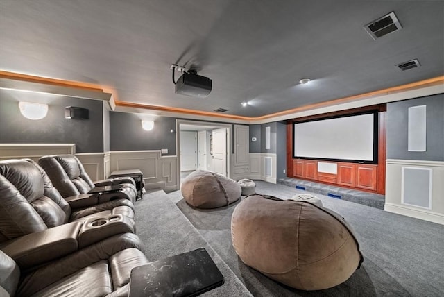 43 Bristol Rd, Wellesley, MA 02481 - carpeted home theater room featuring a decorative wall and wainscoting