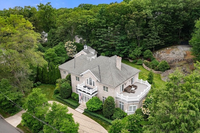 43 Bristol Rd, Wellesley, MA 02481 - aerial view of property and surrounding area with a heavily wooded area