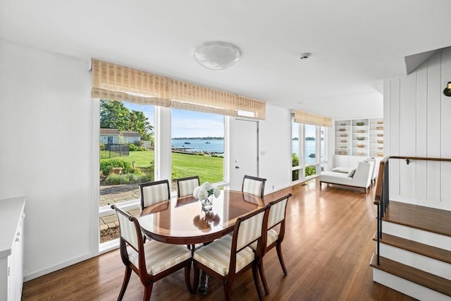 124 William St, Dartmouth, MA 02748 - dining area featuring wood finished floors, healthy amount of natural light, a water view, and baseboards