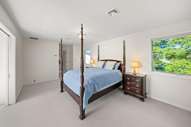 124 William St, Dartmouth, MA 02748 - bedroom featuring multiple windows, light carpet, and baseboards