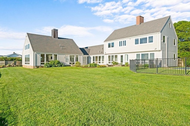 124 William St, Dartmouth, MA 02748 - rear view of property featuring a chimney