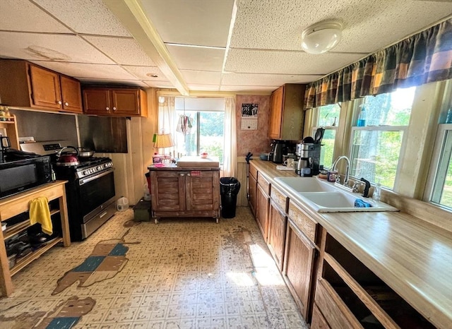 5 Maguire Rd, Ashburnham, MA 01430 - kitchen featuring black microwave, brown cabinets, light floors, and healthy amount of natural light