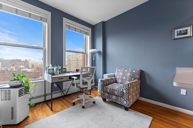 483 Beacon Unit 63, Boston, MA 02115 - office with a city view and wood finished floors