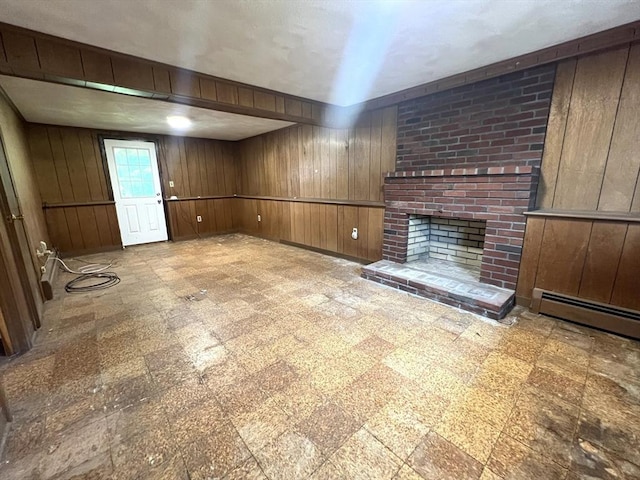 31 Dix Rd, Woburn, MA 01801 - unfurnished living room featuring wood walls, tile patterned floors, a fireplace, and baseboard heating
