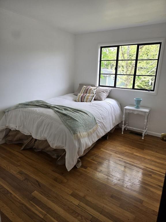 30 Leighton Rd, Boston, MA 02136 - bedroom with dark wood-style flooring and baseboards