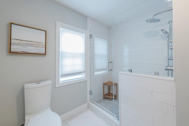 73 Harold St, Milton, MA 02186 - bathroom with toilet, a shower stall, and baseboards