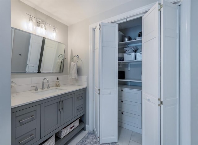 73 Harold St, Milton, MA 02186 - bathroom featuring vanity and a spacious closet