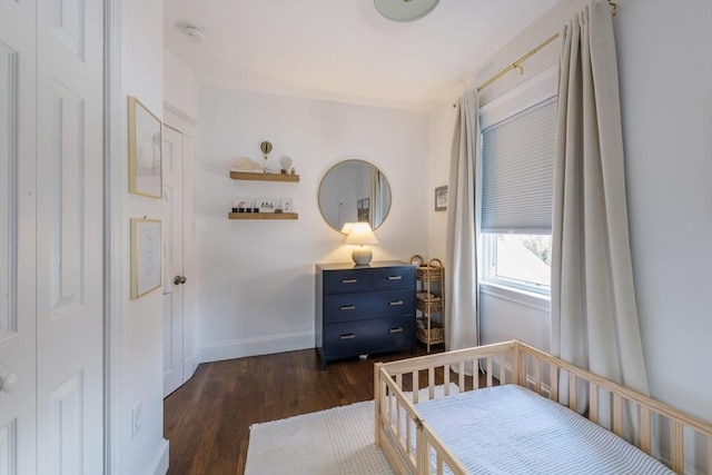 73 Harold St, Milton, MA 02186 - bedroom with dark wood-type flooring and baseboards