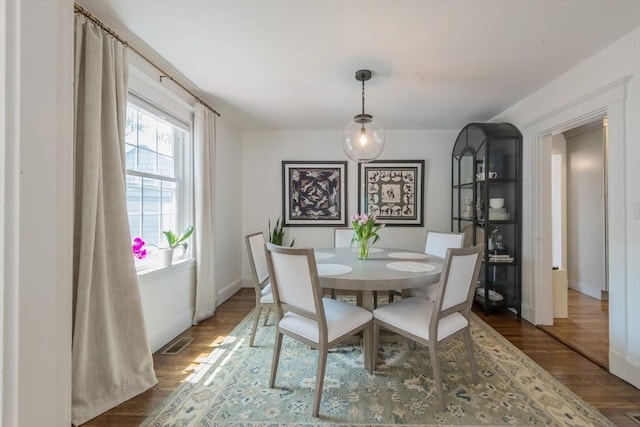 73 Harold St, Milton, MA 02186 - dining room with wood finished floors and baseboards