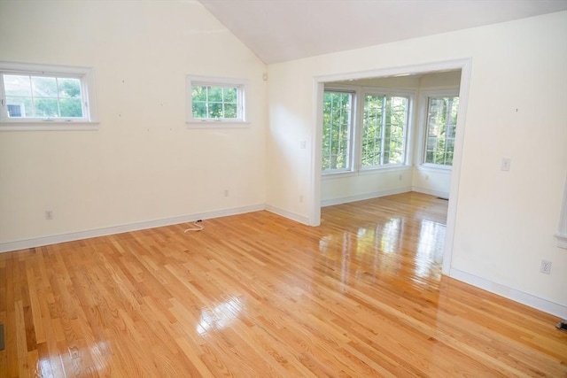 31 Mulligan Dr Unit 31, Weymouth, MA 02190 - spare room featuring light wood finished floors and lofted ceiling