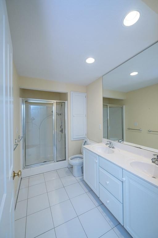 31 Mulligan Dr Unit 31, Weymouth, MA 02190 - bathroom with tile patterned flooring, double vanity, a shower stall, and recessed lighting