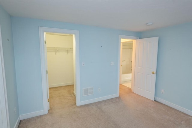 31 Mulligan Dr Unit 31, Weymouth, MA 02190 - unfurnished bedroom with a spacious closet, carpet floors, and a closet