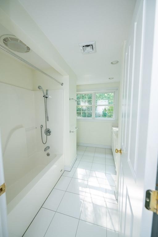 31 Mulligan Dr Unit 31, Weymouth, MA 02190 - bathroom with tile patterned floors and shower / bathtub combination