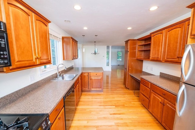 31 Mulligan Dr Unit 31, Weymouth, MA 02190 - kitchen with dishwasher, light wood-type flooring, a peninsula, freestanding refrigerator, and recessed lighting