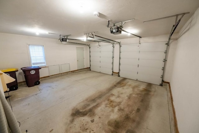 31 Mulligan Dr Unit 31, Weymouth, MA 02190 - garage featuring a garage door opener