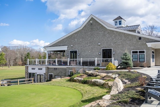 31 Mulligan Dr Unit 31, Weymouth, MA 02190 - back of house featuring a standing seam roof and a metal roof