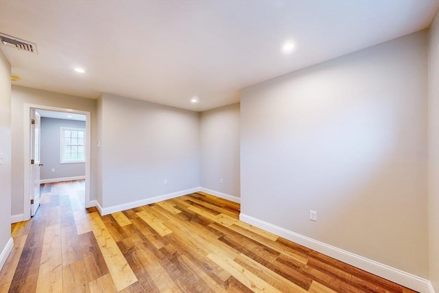 empty room with light wood-type flooring