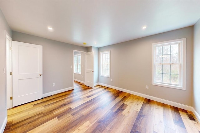 empty room featuring light hardwood / wood-style flooring