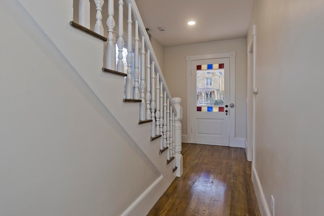 doorway featuring dark wood-type flooring