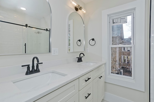 bathroom featuring vanity and walk in shower