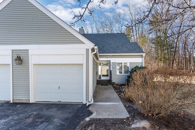 single story home with a garage