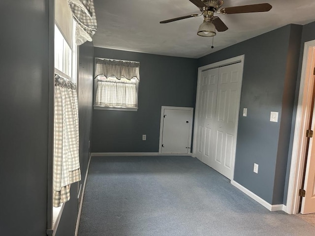 40 Elmwood Cir, Peabody, MA 01960 - unfurnished bedroom featuring carpet, baseboards, a closet, and ceiling fan
