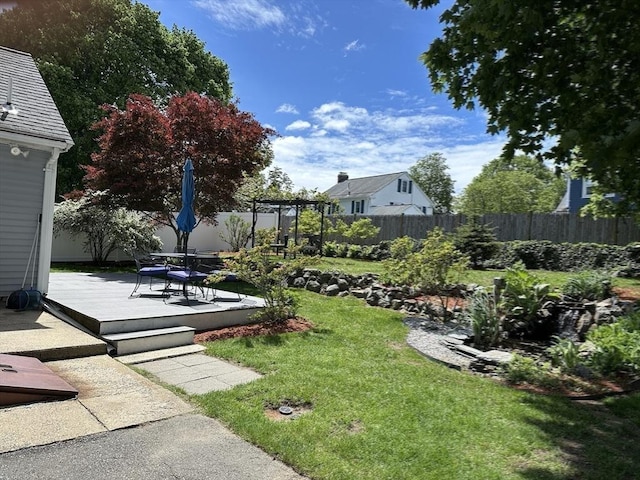40 Elmwood Cir, Peabody, MA 01960 - view of yard featuring a wooden deck