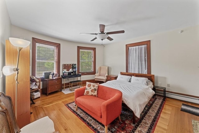 388 Arborway, Boston, MA 02130 - bedroom featuring light wood-style flooring and a ceiling fan