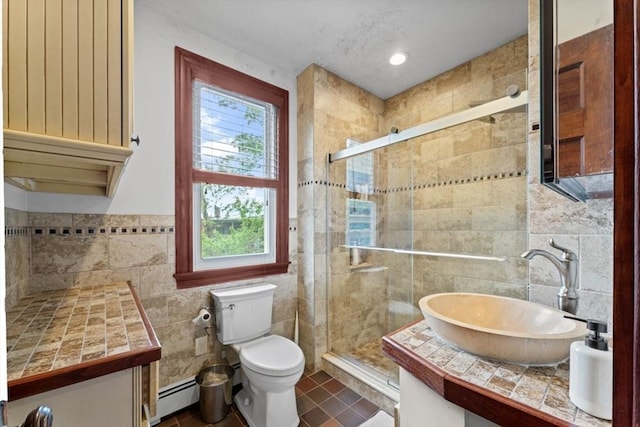388 Arborway, Boston, MA 02130 - full bathroom with tile walls, baseboard heating, a shower stall, healthy amount of natural light, and toilet
