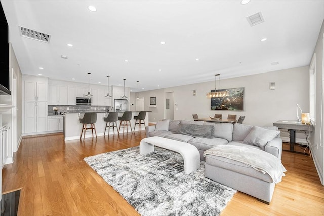 2 Inwood Dr Unit 3003, Woburn, MA 01801 - living area featuring recessed lighting, light wood-type flooring, and baseboards