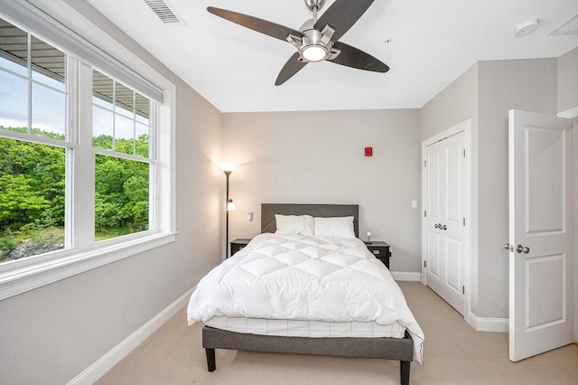 2 Inwood Dr Unit 3003, Woburn, MA 01801 - bedroom with light carpet, baseboards, and ceiling fan