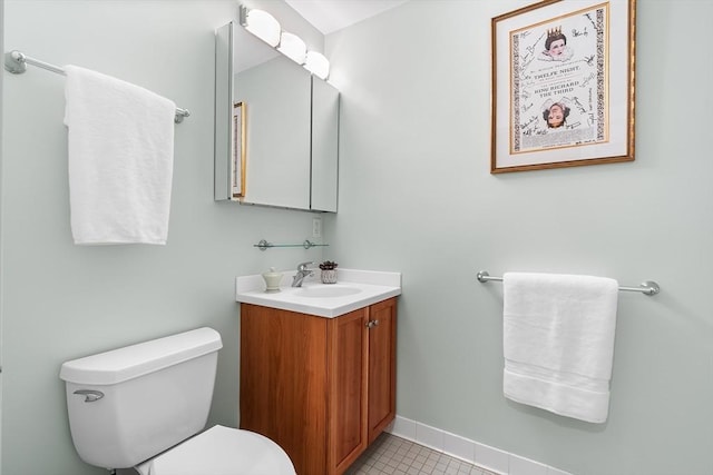 26-B Lake St Unit 26B, Somerville, MA 02143 - bathroom featuring toilet, vanity, tile patterned floors, and baseboards