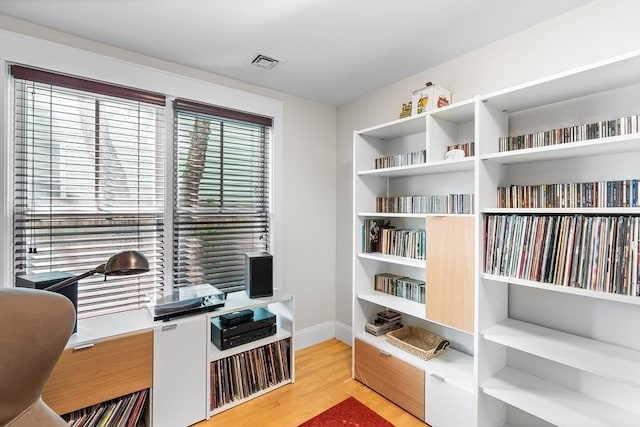26-B Lake St Unit 26B, Somerville, MA 02143 - home office with baseboards and wood finished floors