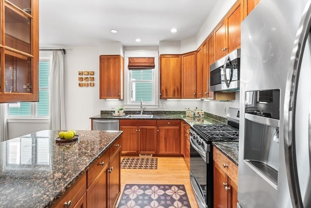 26-B Lake St Unit 26B, Somerville, MA 02143 - kitchen featuring appliances with stainless steel finishes, a sink, light wood-style floors, plenty of natural light, and recessed lighting