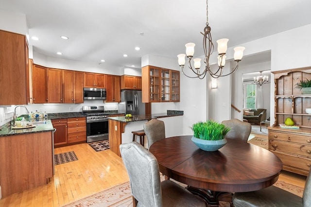 26-B Lake St Unit 26B, Somerville, MA 02143 - dining space featuring a chandelier, light wood-type flooring, and recessed lighting
