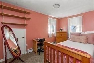 16 Simmons Rd, Nahant, MA 01908 - carpeted bedroom featuring a baseboard radiator