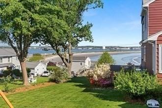 16 Simmons Rd, Nahant, MA 01908 - view of yard featuring a water view