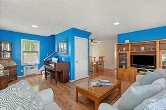 16 Simmons Rd, Nahant, MA 01908 - living area featuring wood finished floors and radiator heating unit