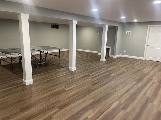 47 Woodcock Ln, Marlborough, MA 01752 - finished basement with baseboards, dark wood finished floors, and recessed lighting